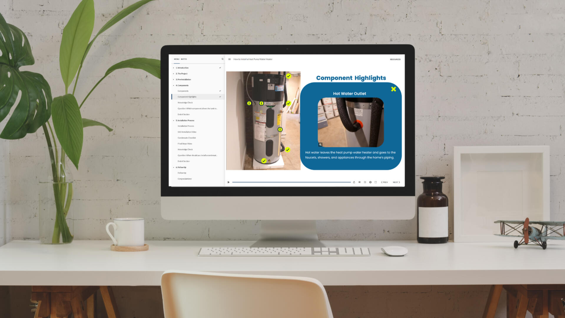 iPad with Evolve training on a desktop flatlay