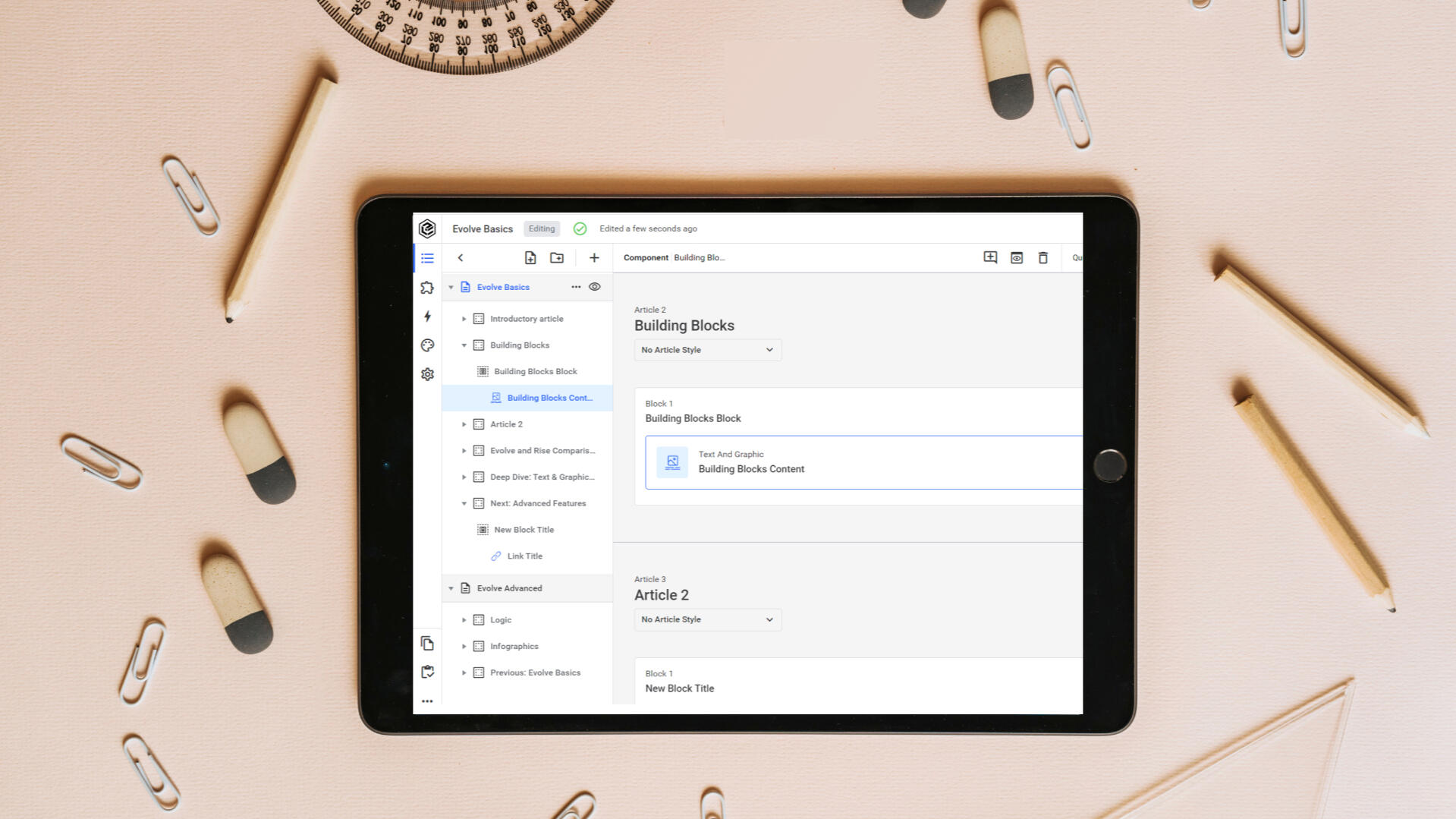 iPad with Evolve training on a desktop flatlay